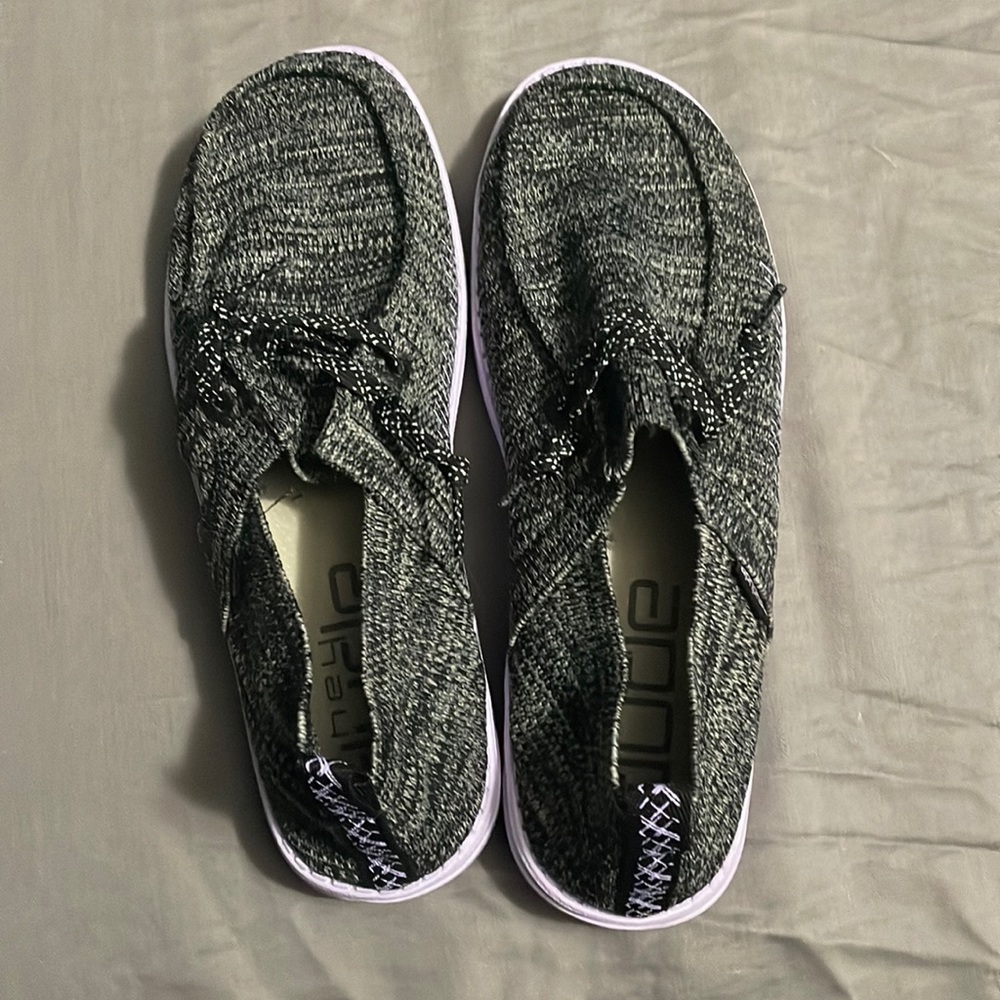 Purple and black size 8 hey dudes. Never worn